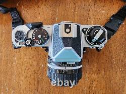 Nikon FE vintage camera with multiple lenses (package deal)