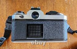 Nikon FE vintage camera with multiple lenses (package deal)