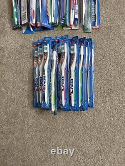Toothbrushes (Soft) bulk 100 all New with many namebrands, package deal